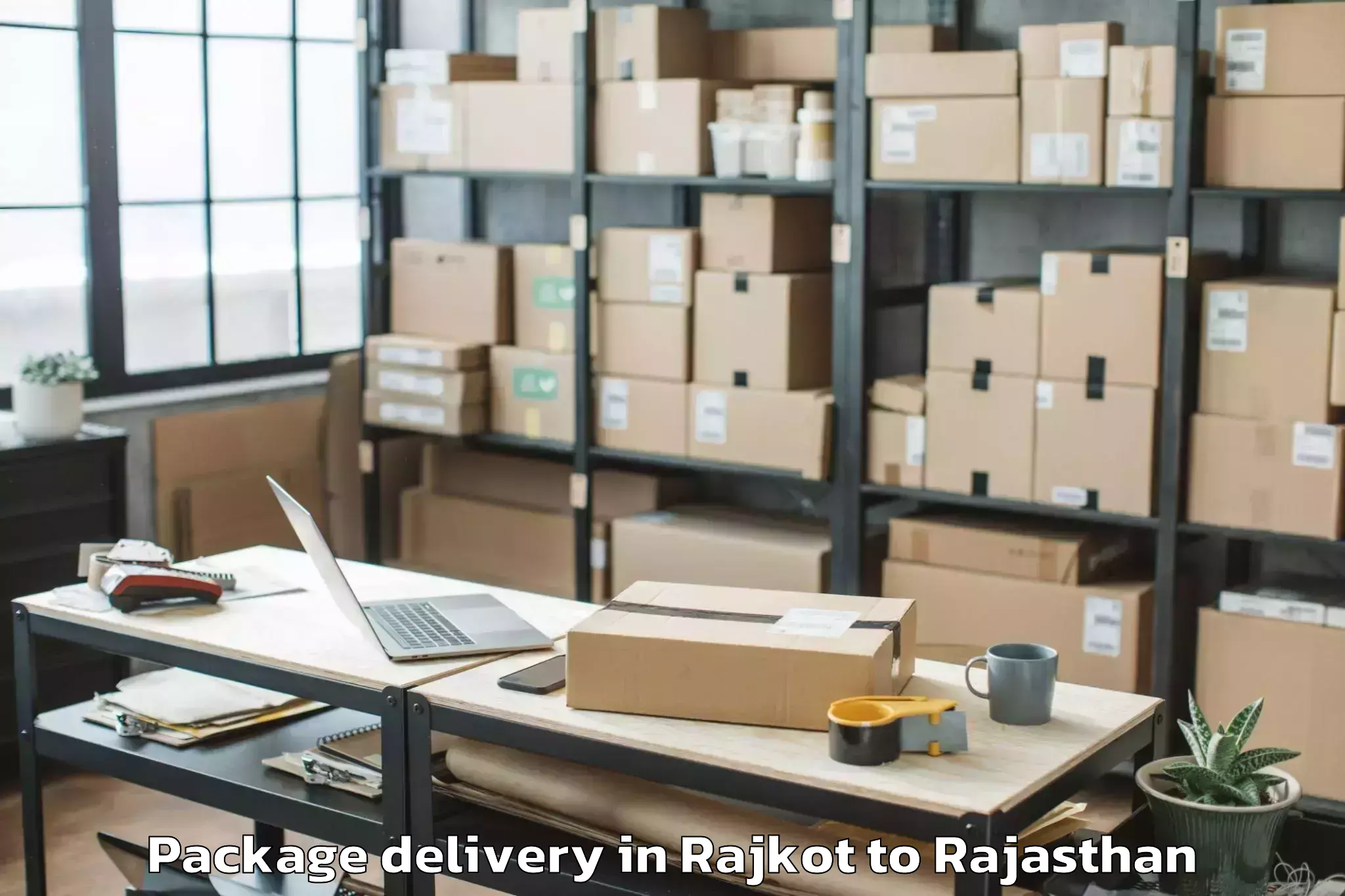 Hassle-Free Rajkot to National Law University Jodhpu Package Delivery